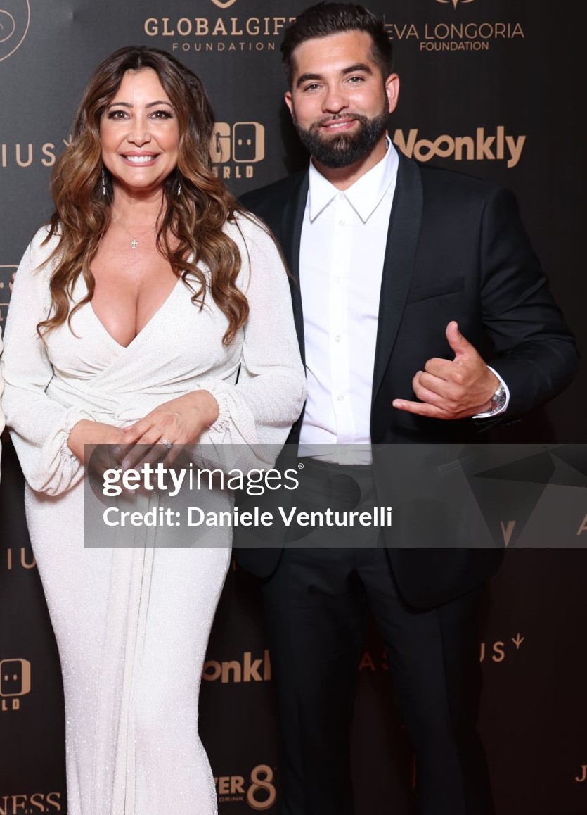 What expression goes through the handsome man's mind about the woman next to him?