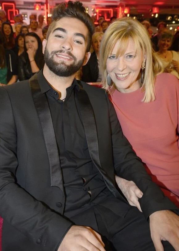 What move did the young man make that made the mature woman next to him cry?