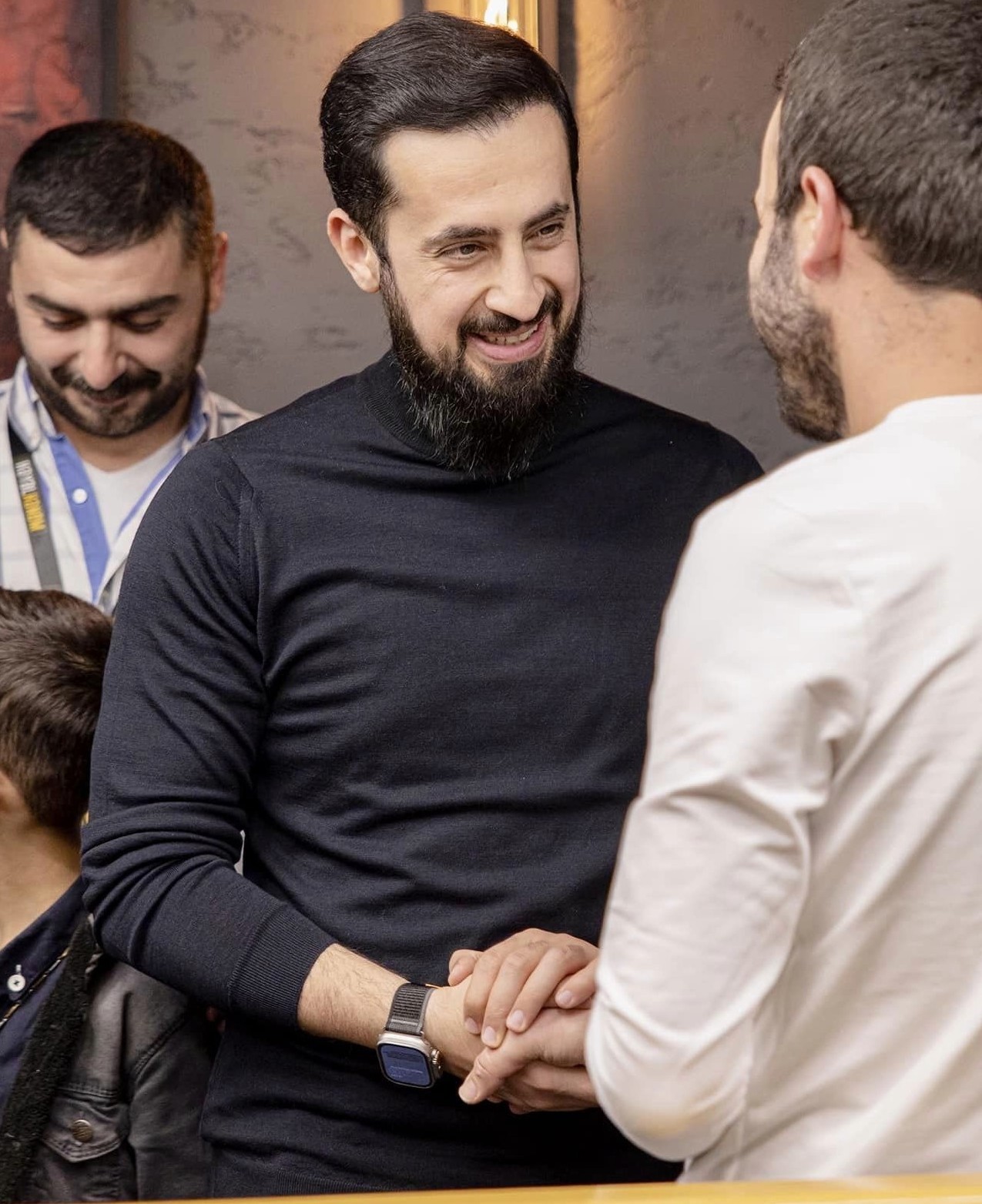 What does he say to the man with his eyes? Is he threatening or insulting him?